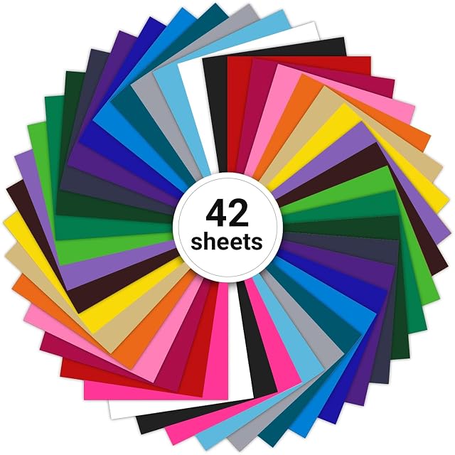 Quarante-deux feuilles de vinyle colorées disposées en cercle autour d’une étiquette 42 sheets