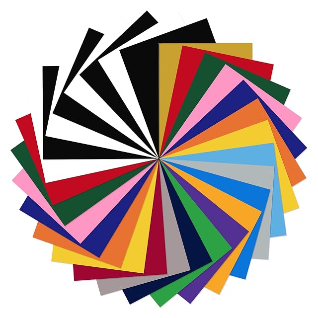 Feuilles de flex colorées disposées en cercle, dont du noir et du blanc