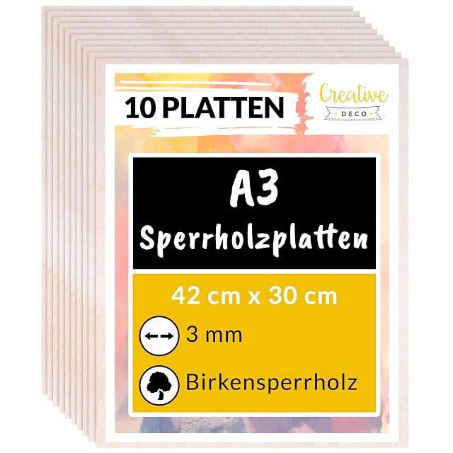 Pile de plaques de contreplaqué sous une étiquette Creative Deco indiquant 10 Platten, A3, 42 × 30 cm, 3 mm, Birkensperrholz