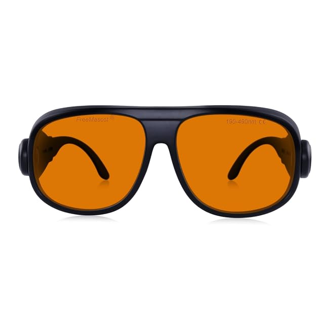 Lunettes FREEMASCOT à verres orange dans une monture noire, un verre imprimé de sa plage de 190–490 nm