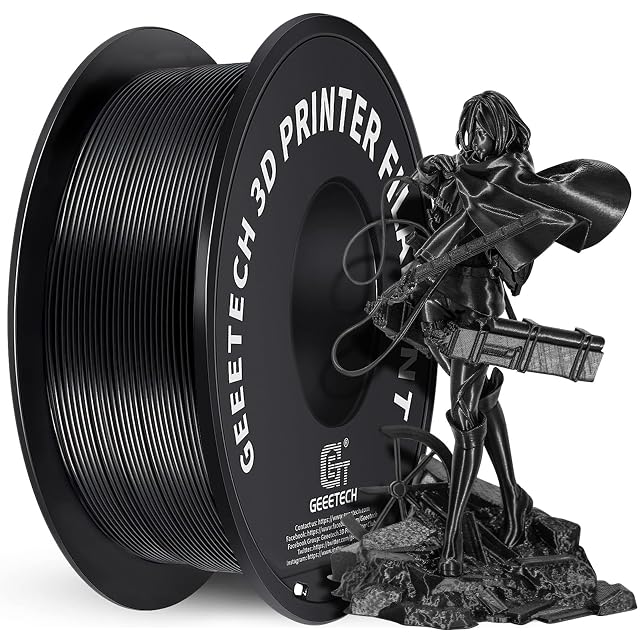 Bobine de filament PLA noir GEEETECH à côté d’une figurine imprimée noire