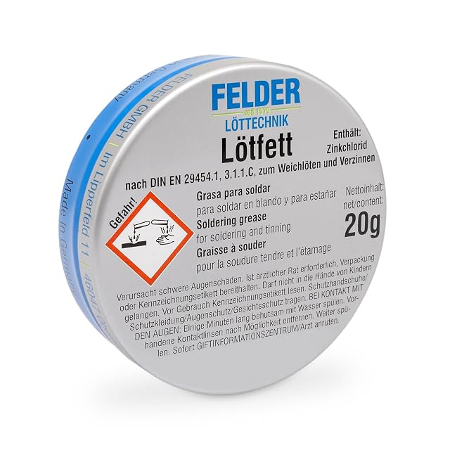 Boîte FELDER Lötfett de 20 g avec un pictogramme de danger corrosif, le mot Gefahr et une ligne sur la teneur en chlorure de zinc